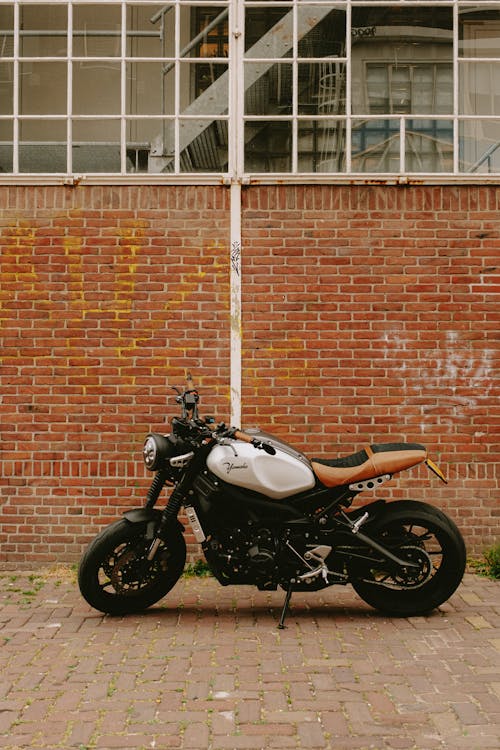 Motorcycle Parked by Wall