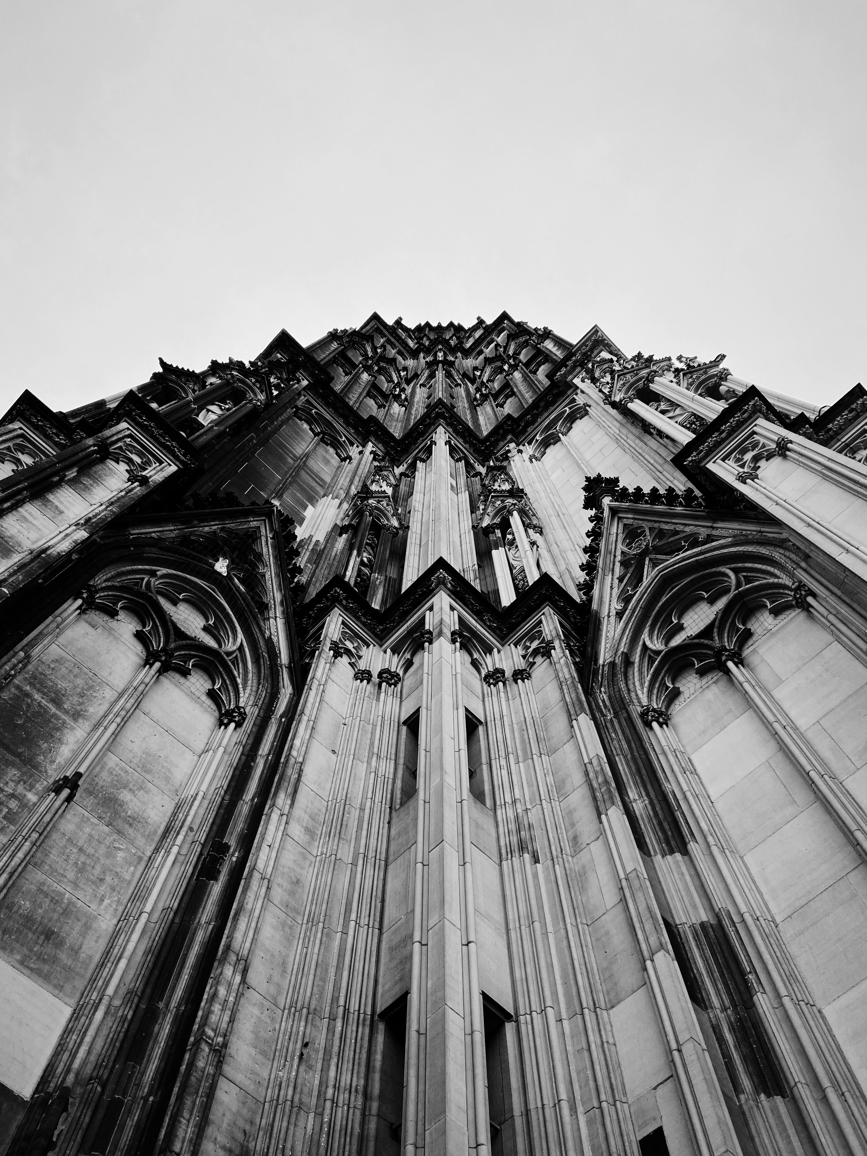 Low Angle Shot of the Facade of the Cologne Cathedral · Free Stock Photo