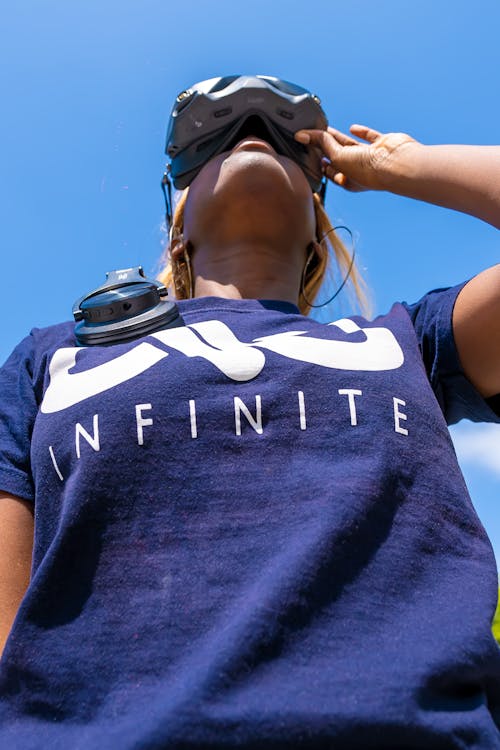 Woman Standing in Goggles