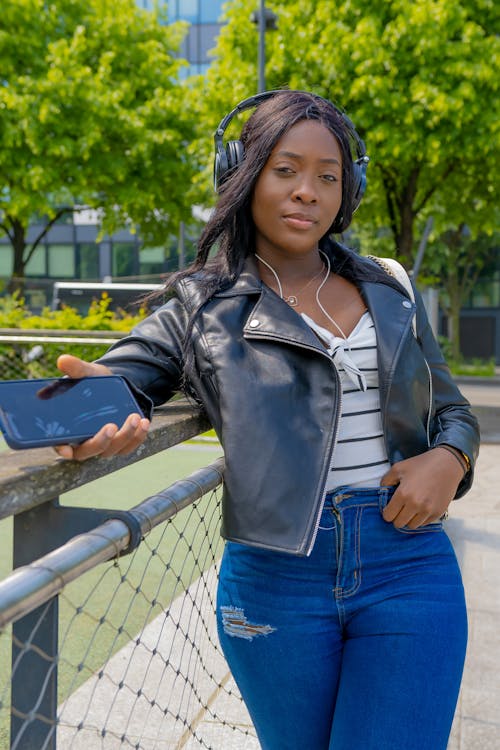 African Woman Wearing Leather Jacket in a Park