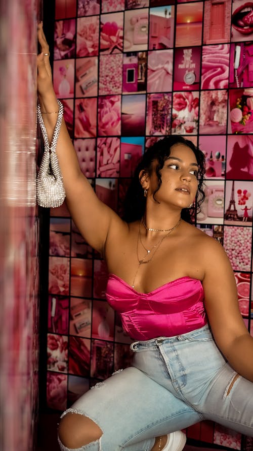 Woman Posing in Pink Corset 