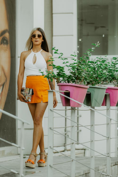 Elegant Woman Walking on a Street 