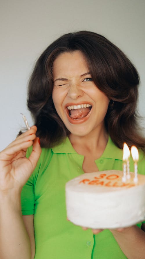 Free Smiling Woman with Birthday Cake Stock Photo