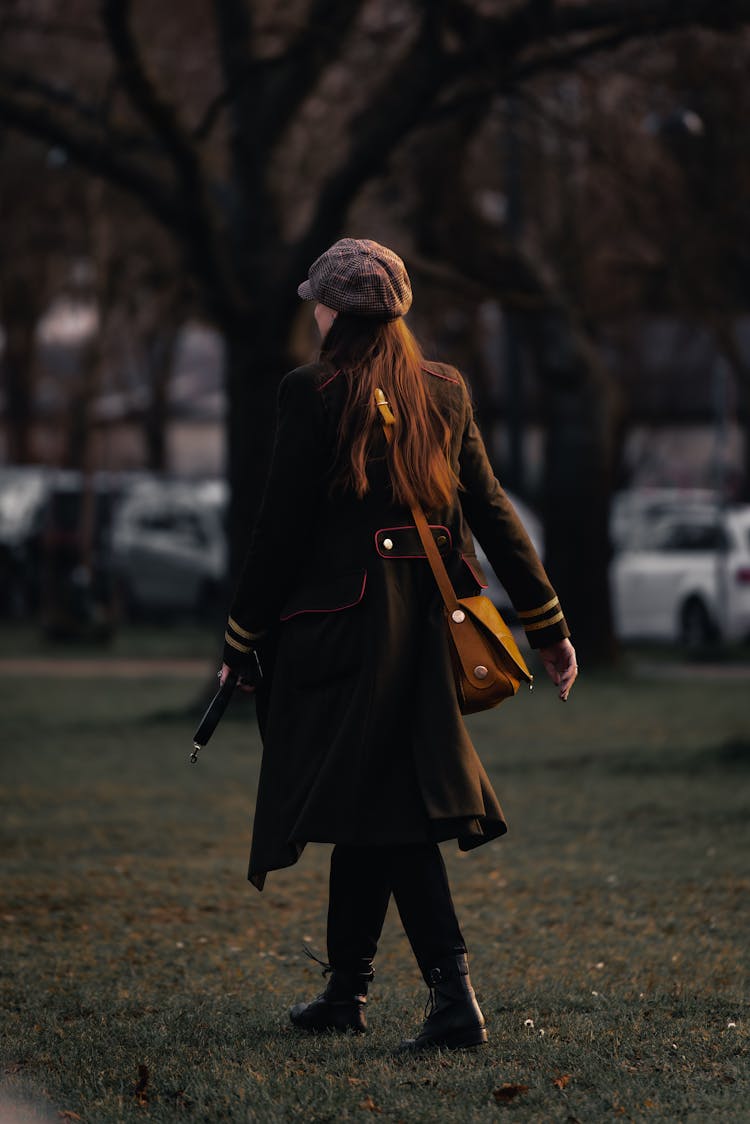 Woman Walking In A Park 