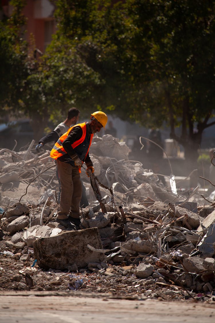 Construction Worker In A Demolished City