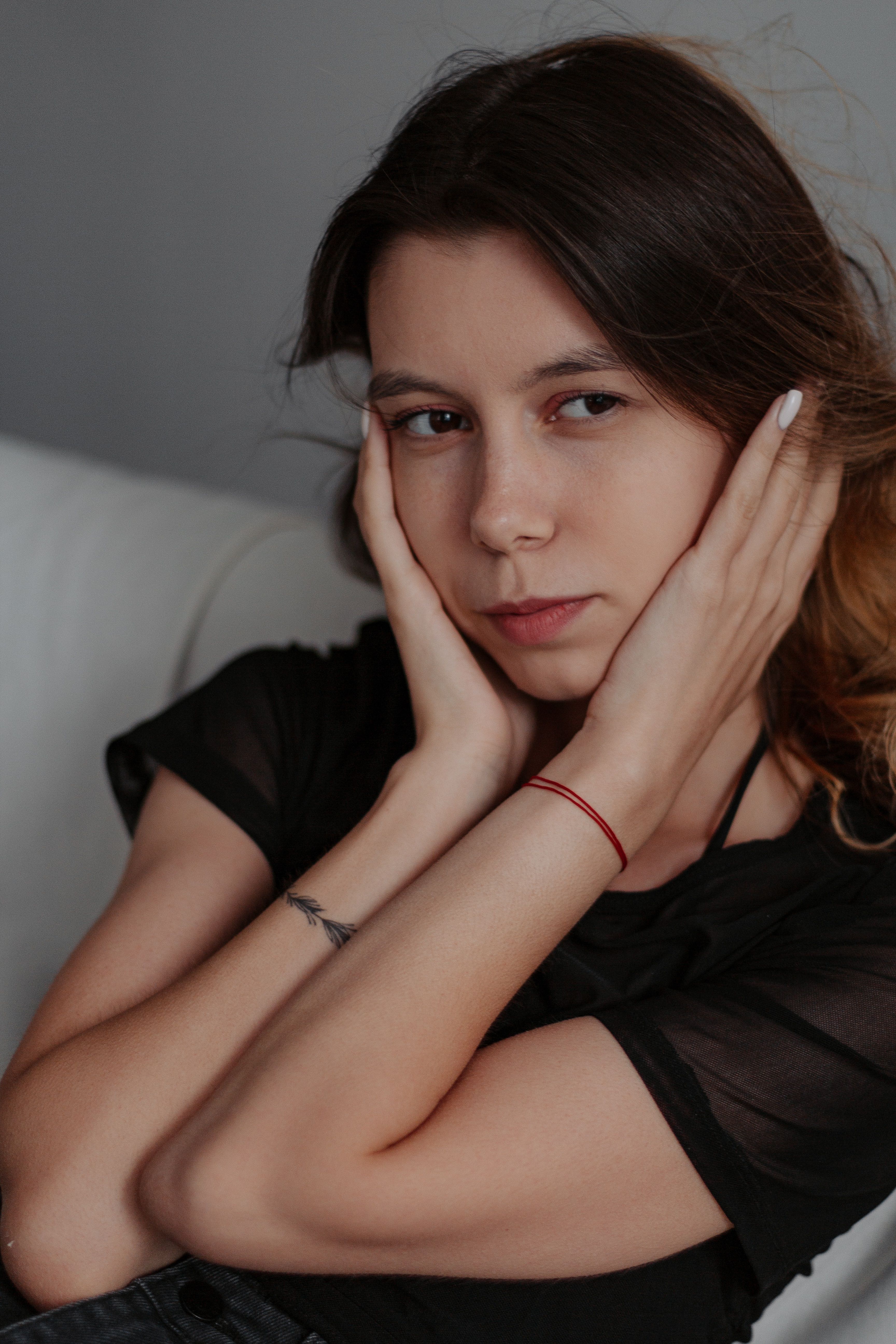 A woman with long hair and a black shirt · Free Stock Photo