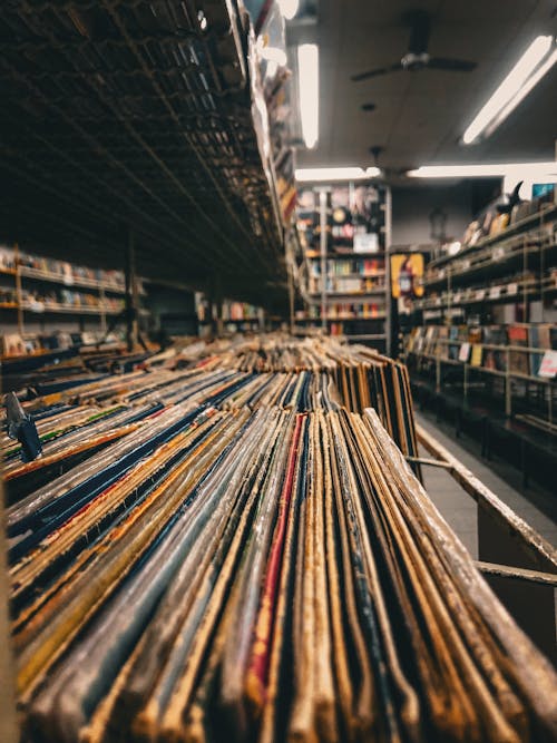A record store with many records stacked on shelves