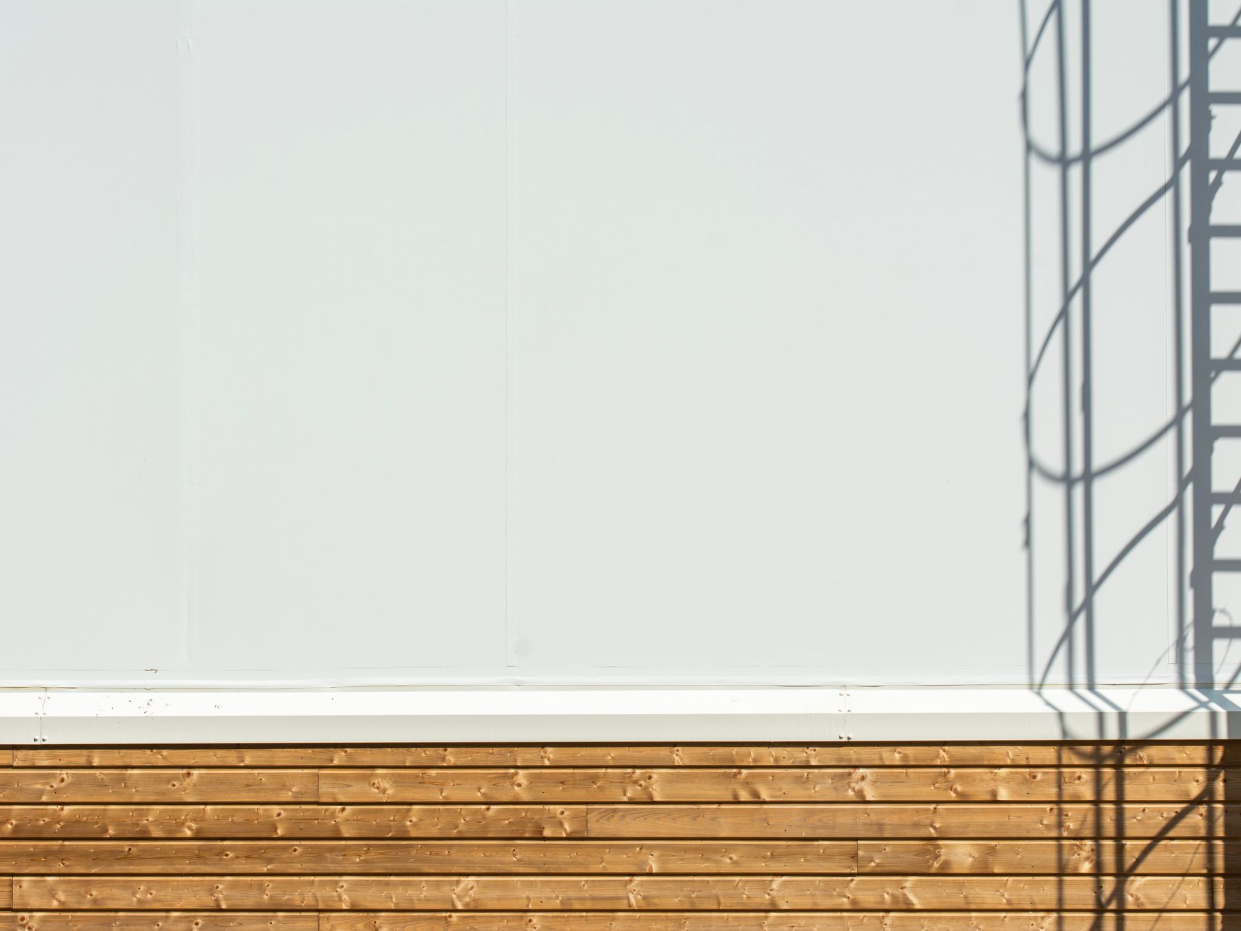Fence and Decking Painting in Wembley — woodwork brushed to a crisp, smooth line