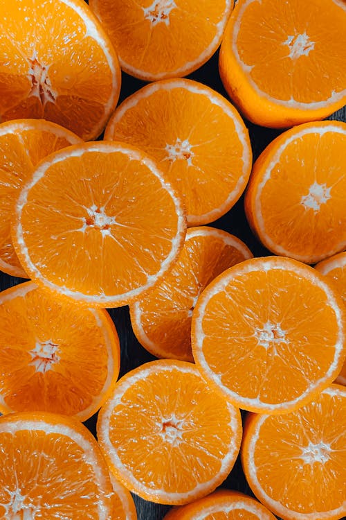 Бесплатное стоковое фото с апельсины, вертикальный выстрел, здоровый