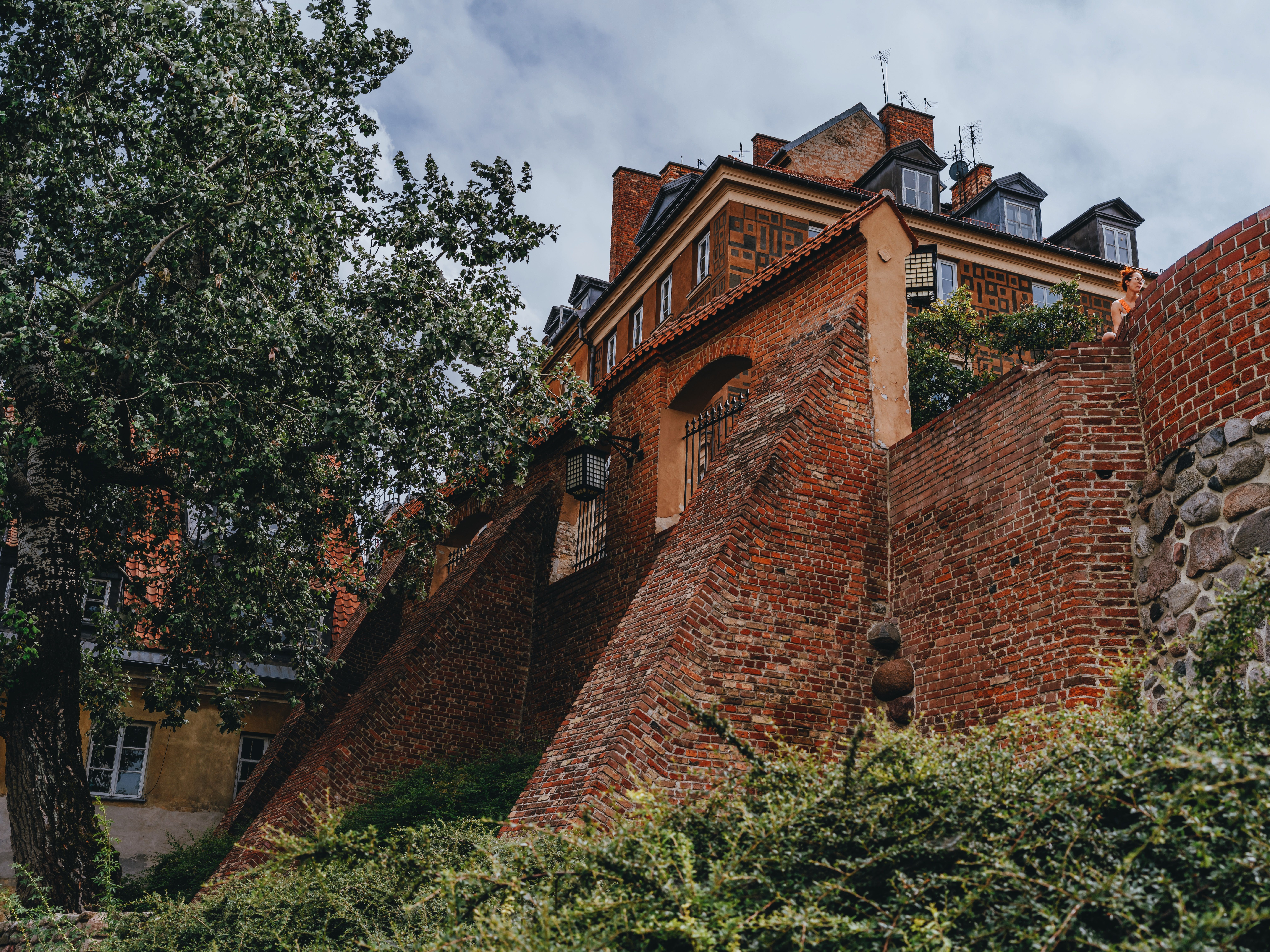 A captivating view of classic brick architecture in Warsaw, showcasing local landmarks and urban charm. — Trójmiasto