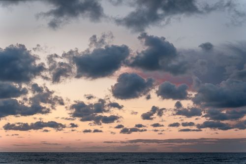 Free Beautiful cloud-covered sunset over the Baltic Sea in Pāvilosta, Latvia. Stock Photo