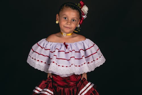 A Girl Wearing a Traditional Dress