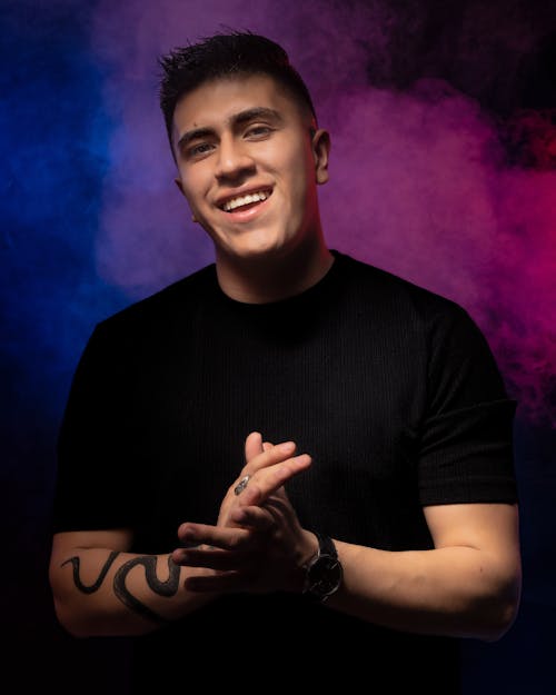 Studio Shot of a Young Man with a Tattoo 