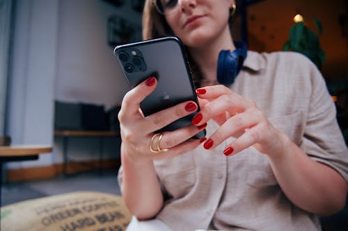 Woman Holding Smartphone