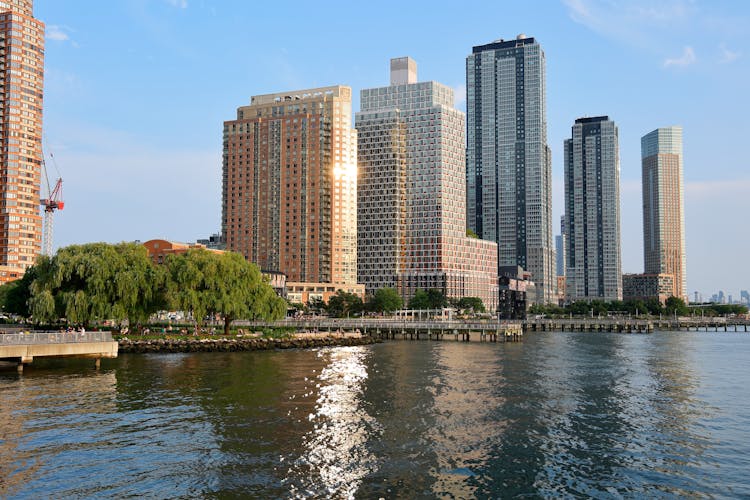 Tall Apartments With A River In The Foreground