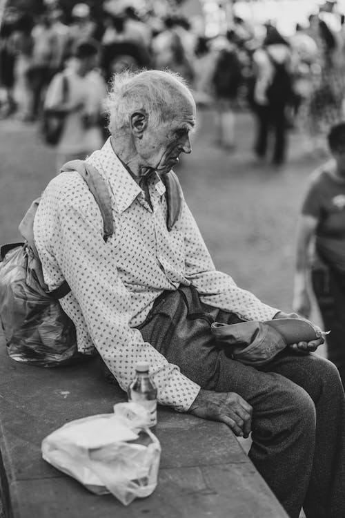 Homeless man, black and white photo portrait