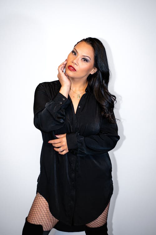 A Woman Posing on a White Background