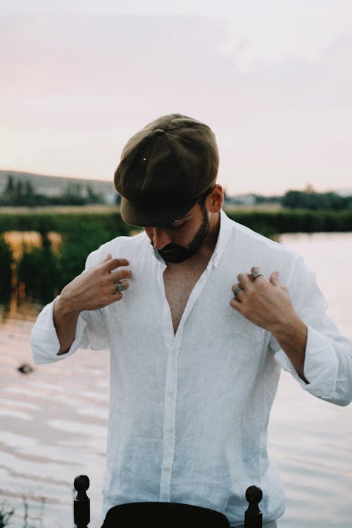 Man in Shirt Looking Down