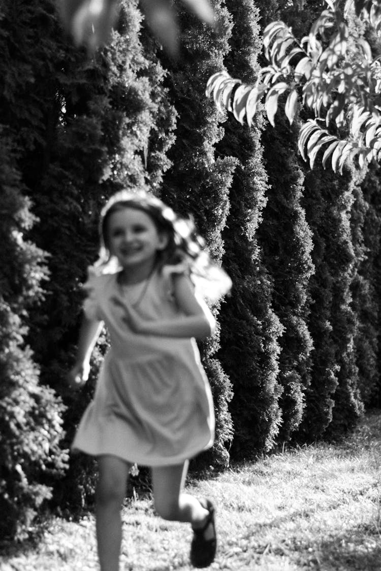 Girl Running In Yard