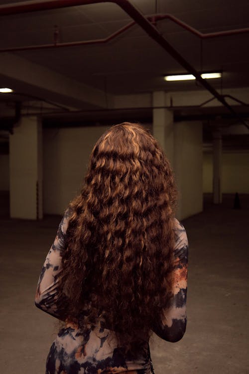 Back View of a Woman with Long Wavy Hair 