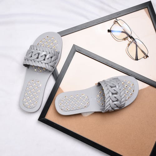 Gray Slippers and Eyeglasses 