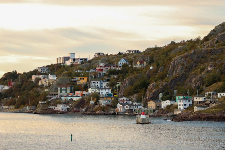 Houses On A Rocky Hill At An Ocean Coast, Saint John’s, Newfoundland, Canada