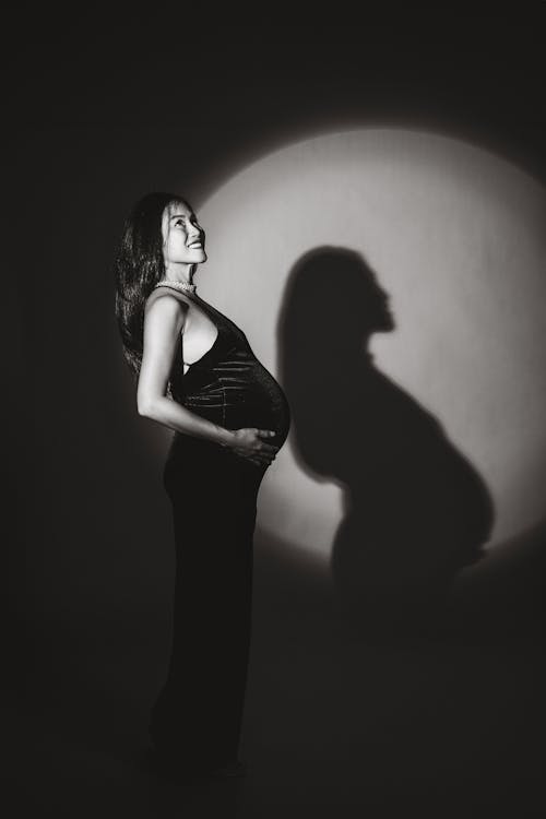 Безкоштовне стокове фото на тему «вагітна, вертикальні постріл, вродлива»