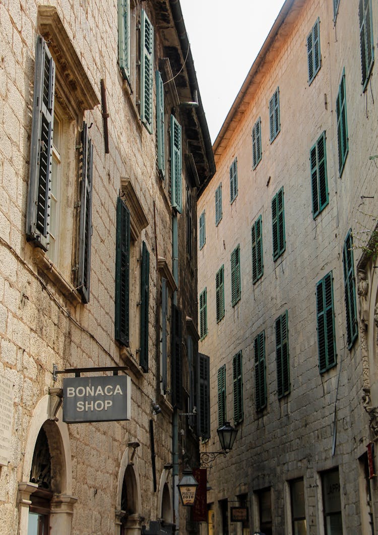 Old Buildings On A Narrow Street In Kotor, Montenegro