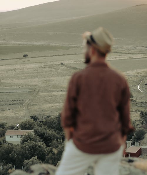 Selective View of a Man Looking at a View of Rural Landscape 