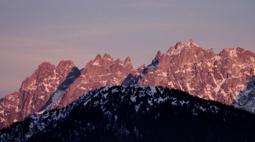 Free Stunning sunrise view of the pink-tinted peaks at Les Deux Alpes, France. Stock Photo