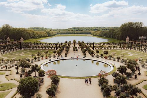 Free Stunning aerial view of Versailles gardens and ponds on a sunny day. Stock Photo