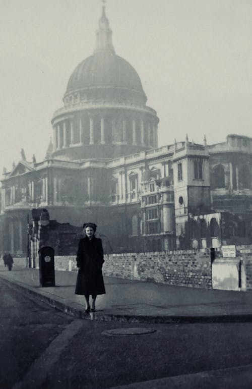 Woman with St Pauls Cathedral behind in Black and White
