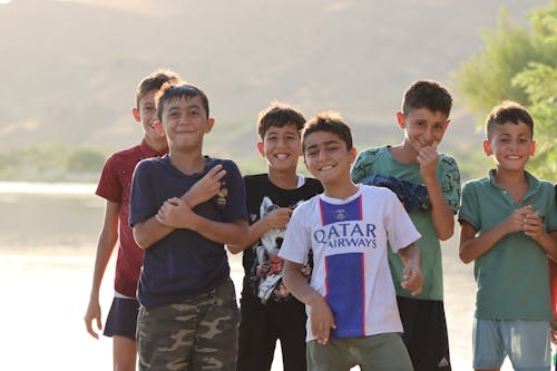 A Group of Young Boys Smiling 