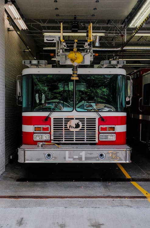 A Firetruck Parked in the Garage · Free Stock Photo