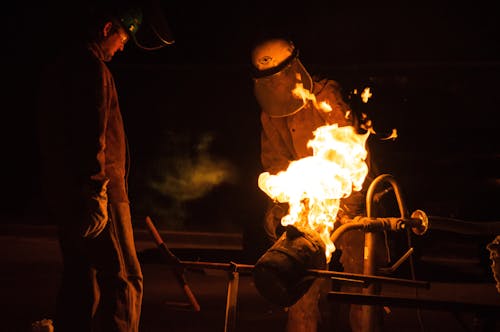 Man Working in Ironworks