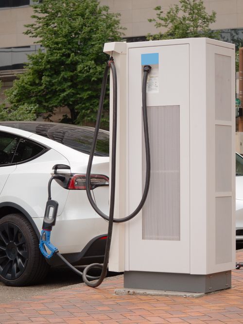 Electric vehicle charging at a home charging station