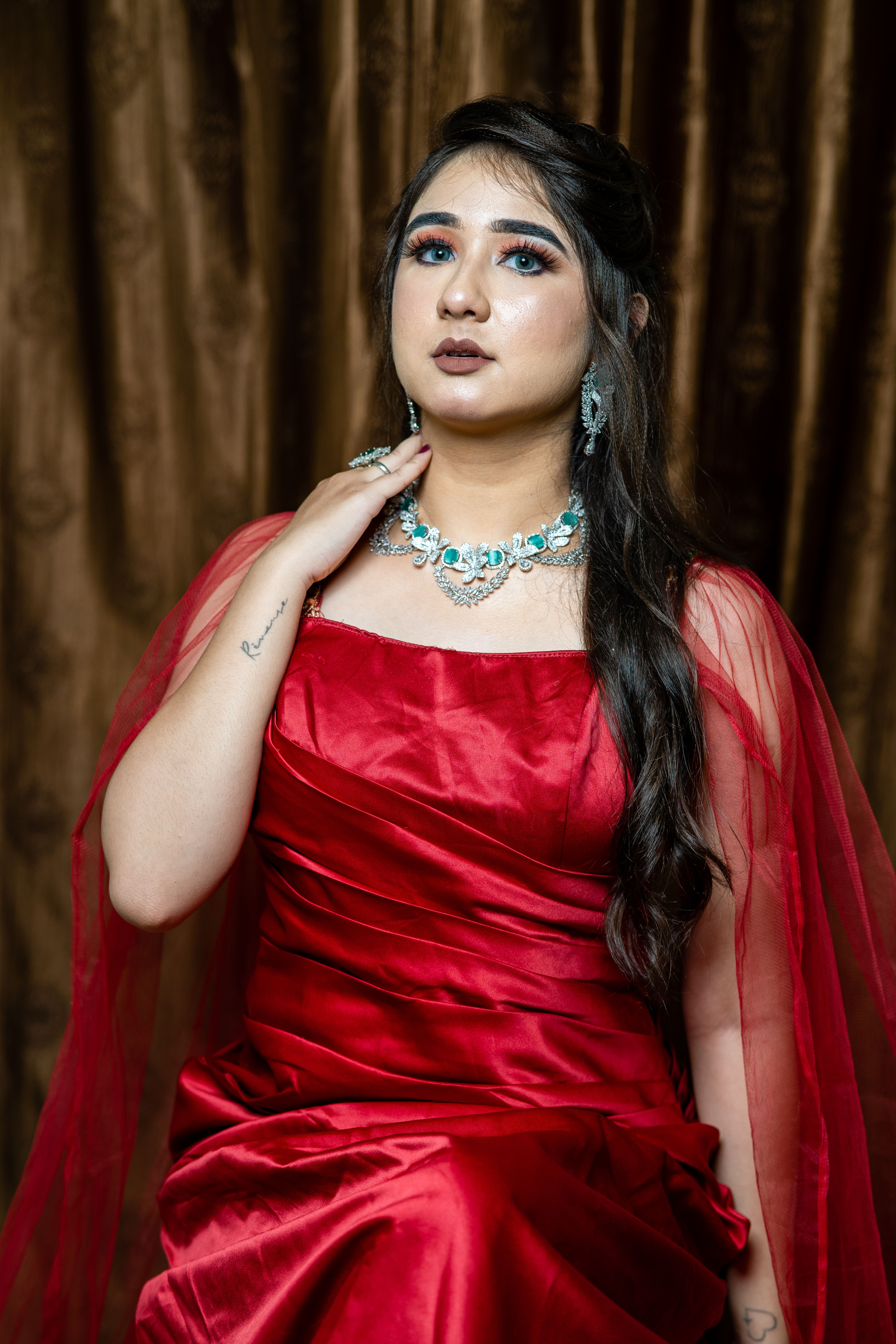 Young Woman Posing in a Long Red Dress · Free Stock Photo