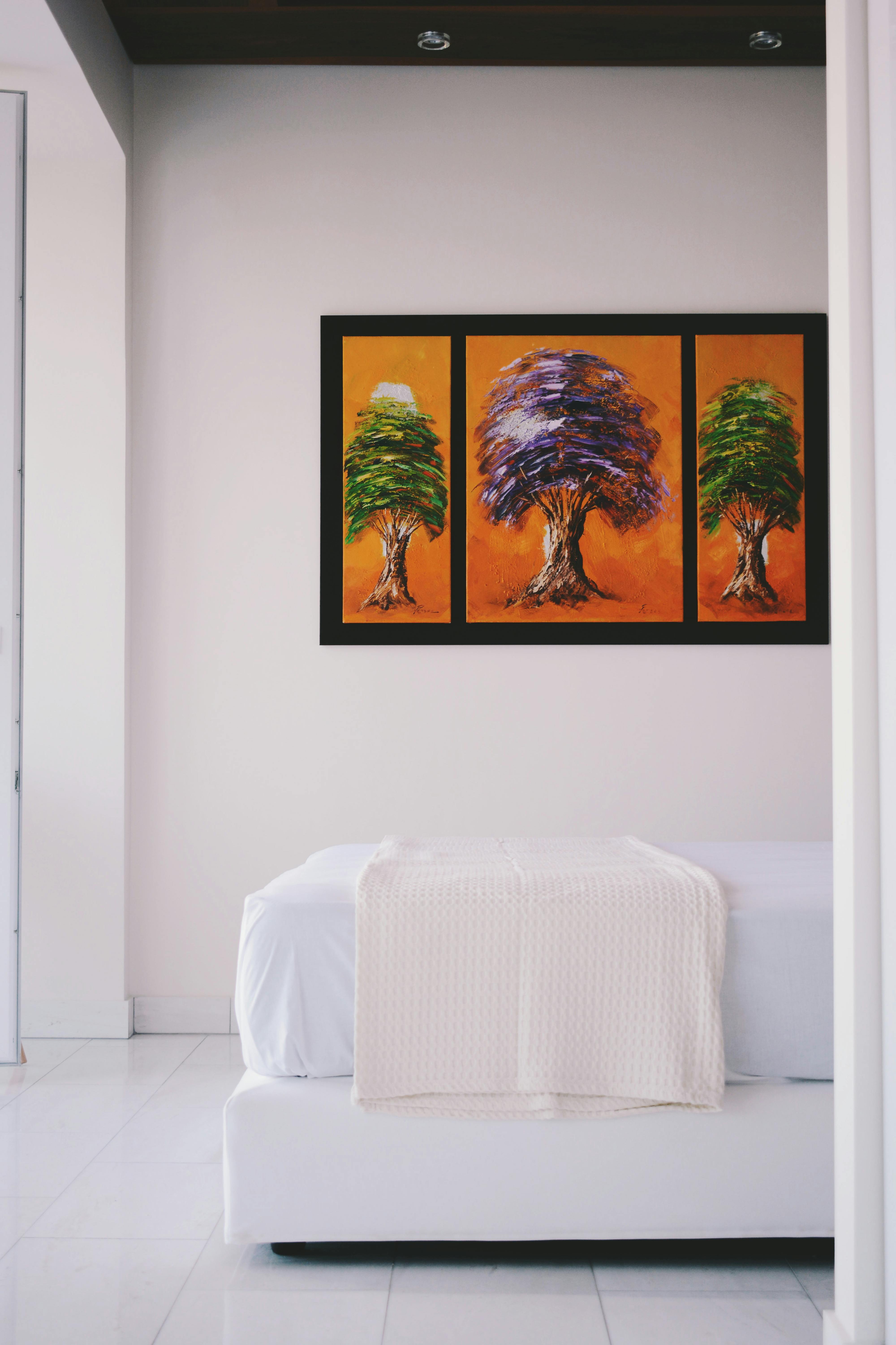 Painting On White Painted Wall · Free Stock Photo