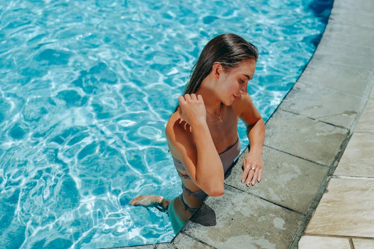 Woman In The Swimming Pool