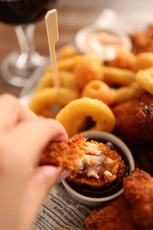 Fried Chicke Wing in Hand