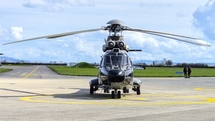 Military Helicopter On An Airfield