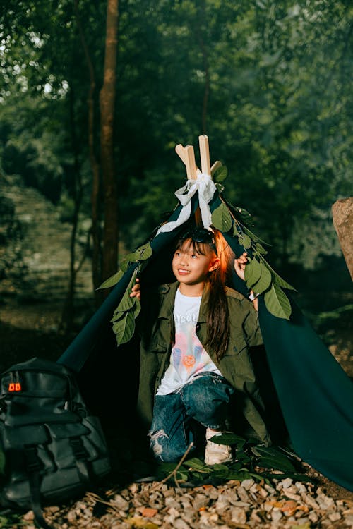 Girl in a Tent and a Backpack 