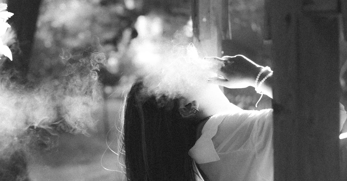 Smoking Railing Woman Leaning on Railing and Smoking · Free Stock Photo