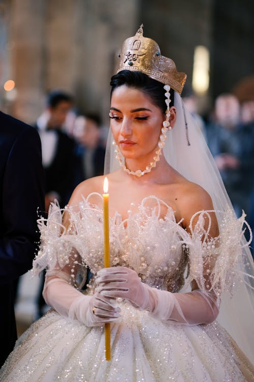 Bride Holding Candle on Wedding
