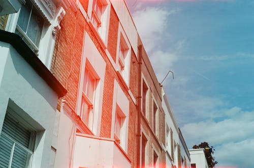 Red Light over Buildings Walls