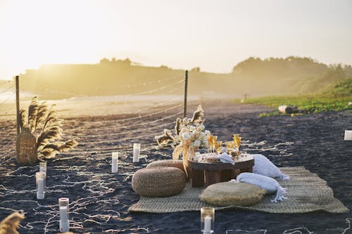 Table and Decorations on Beach at Sunset