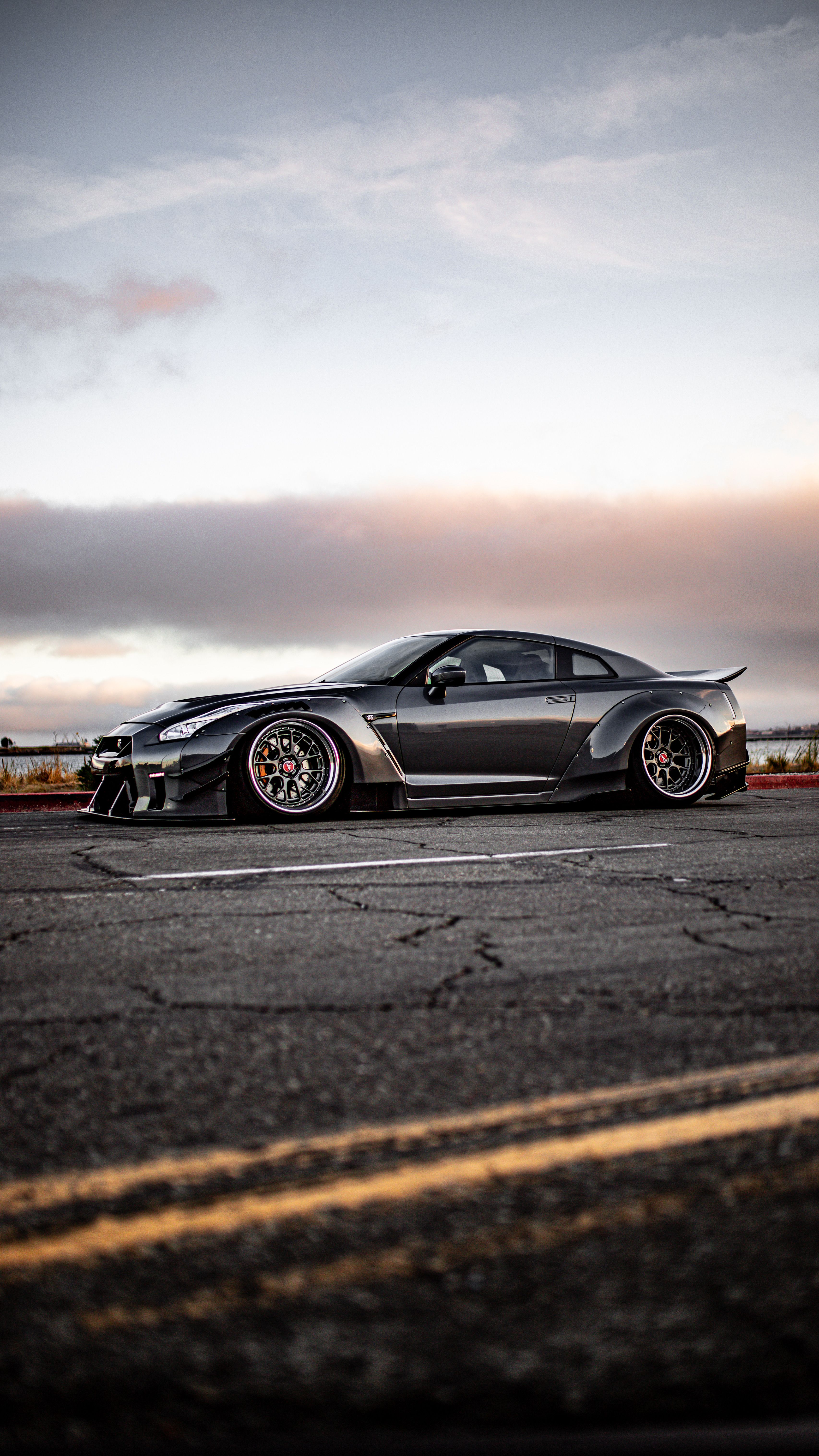 A Nissan GT-R on an Asphalt Street · Free Stock Photo