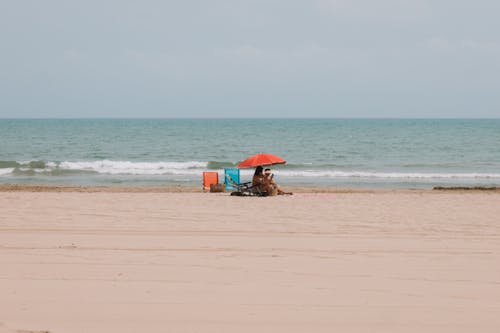 Ingyenes stockfotó esernyő, homok, horizont témában