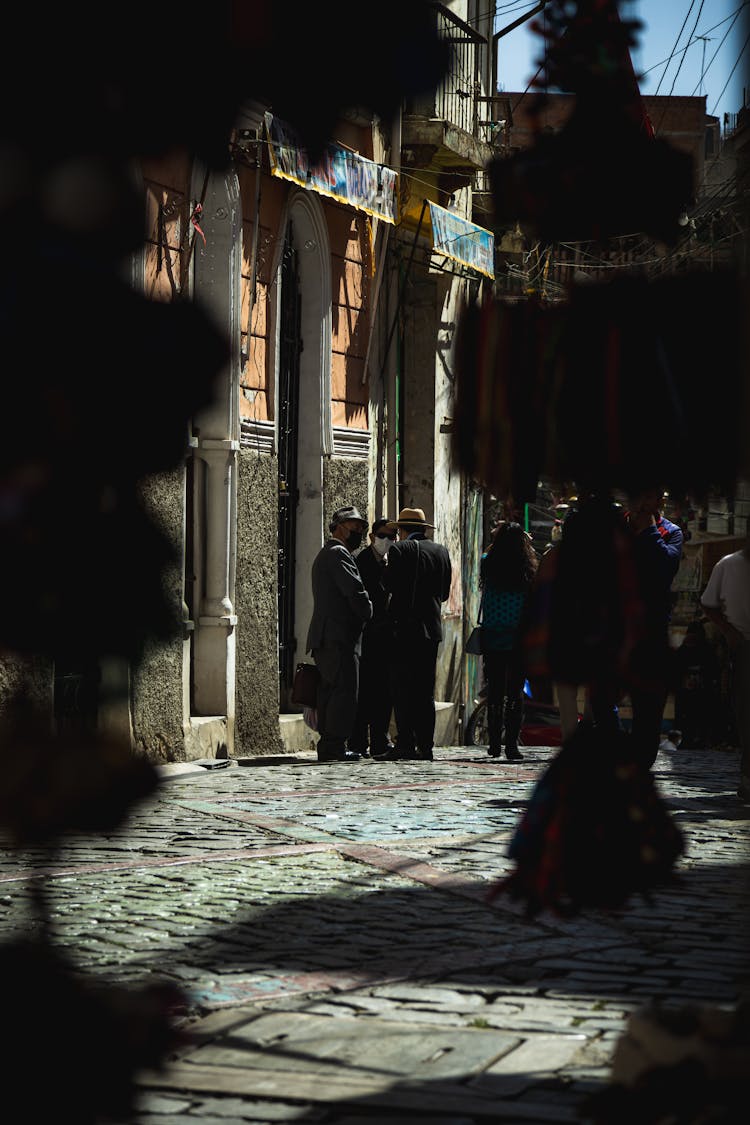 People Standing In A City