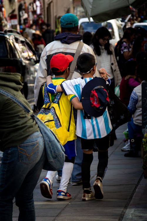 Kids Walking on Busy Street
